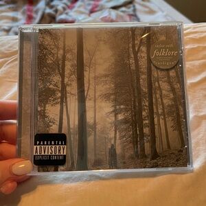 UNOPENED folklore CD